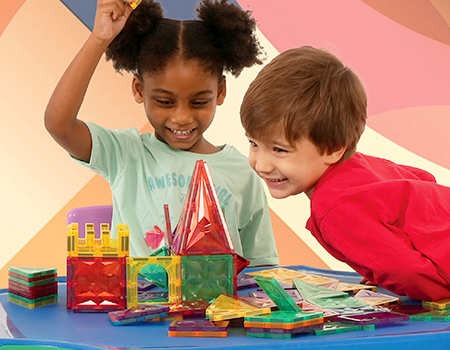 Child Playing with Tevo Zippi Magnetic Tiles