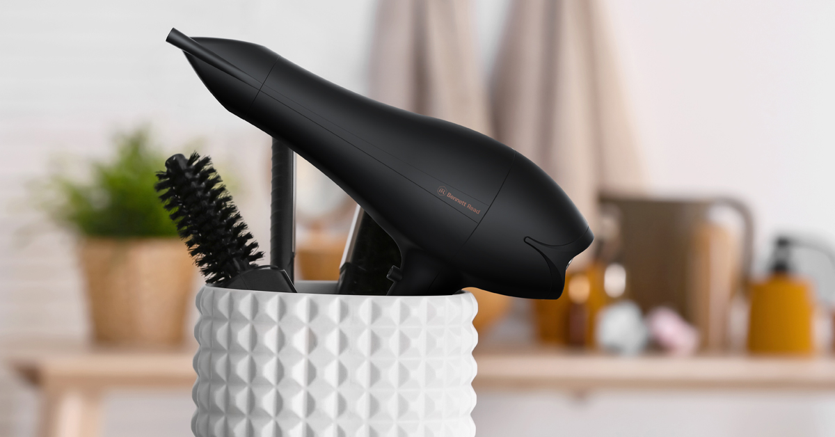 Lifestyle image of hair dryer on dresser