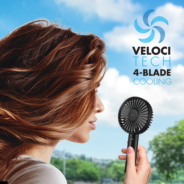 woman using electric hand fan